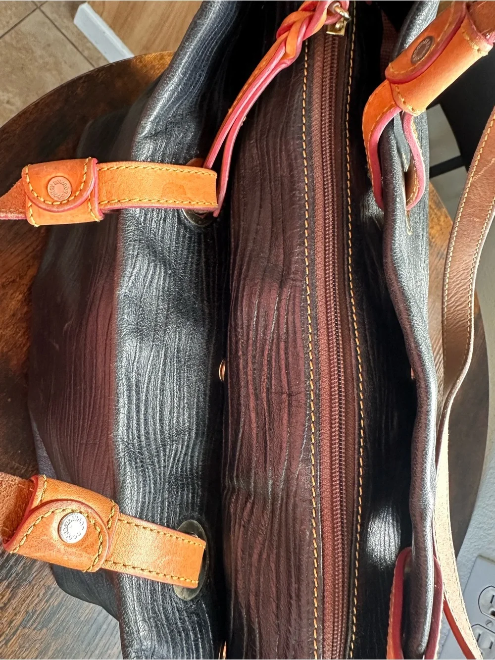 Dooney & Bourke Black Tote with Brown Leather Handles